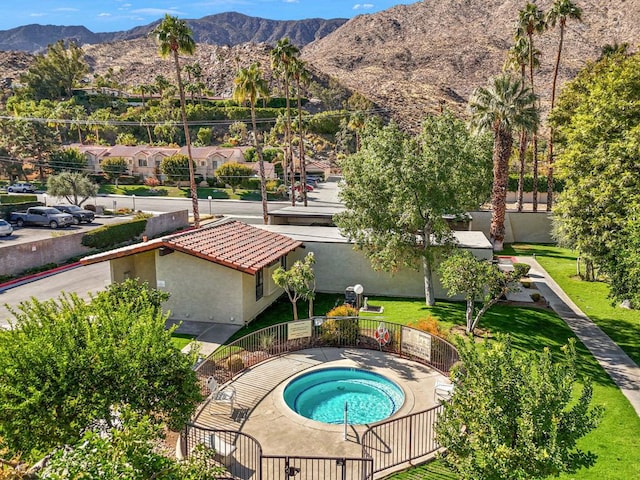 view of pool with a mountain view