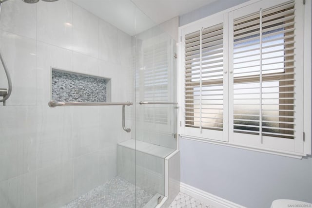 bathroom with an enclosed shower