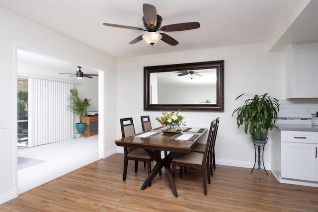 dining room with light hardwood / wood-style floors