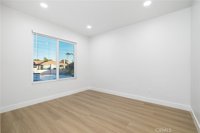 empty room featuring light hardwood / wood-style floors