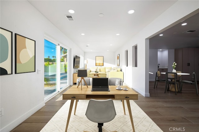 office space featuring dark wood-type flooring