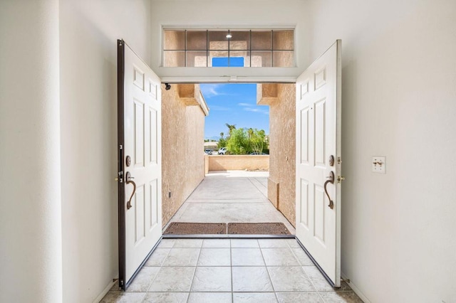 interior space featuring light tile patterned floors