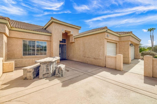 exterior space featuring a garage