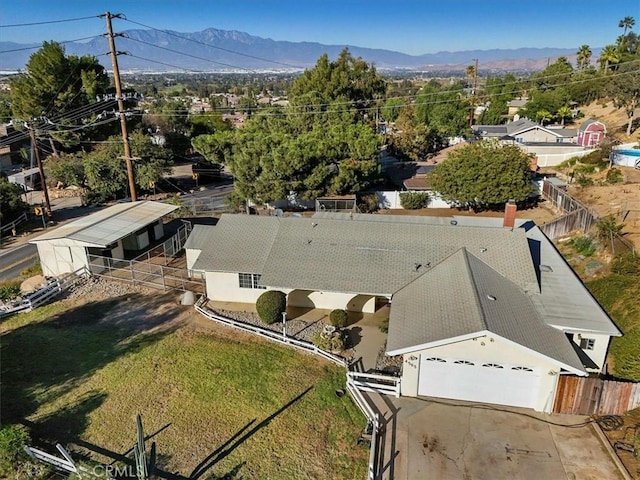 drone / aerial view featuring a mountain view