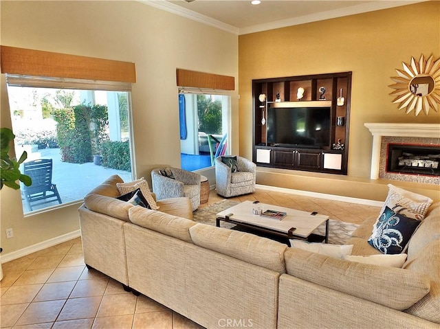 living room featuring crown molding, plenty of natural light, and tile patterned flooring