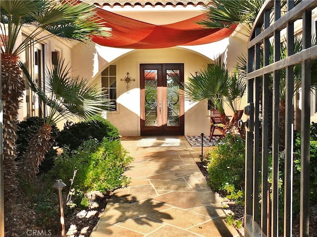 view of exterior entry with french doors