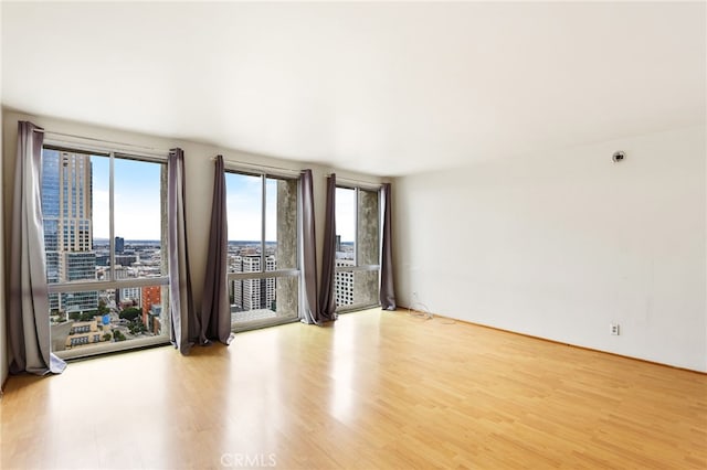 unfurnished living room featuring light hardwood / wood-style flooring