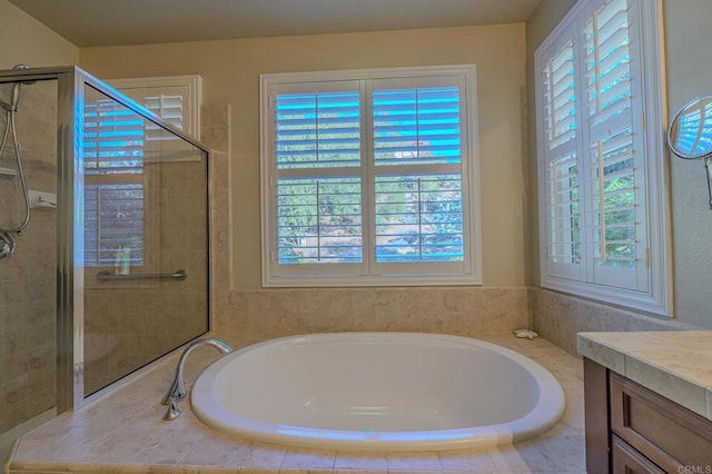 bathroom with vanity and plus walk in shower