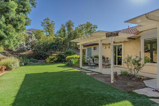 view of yard with a pergola and a patio