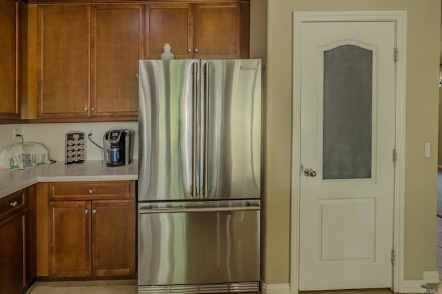 kitchen with stainless steel refrigerator