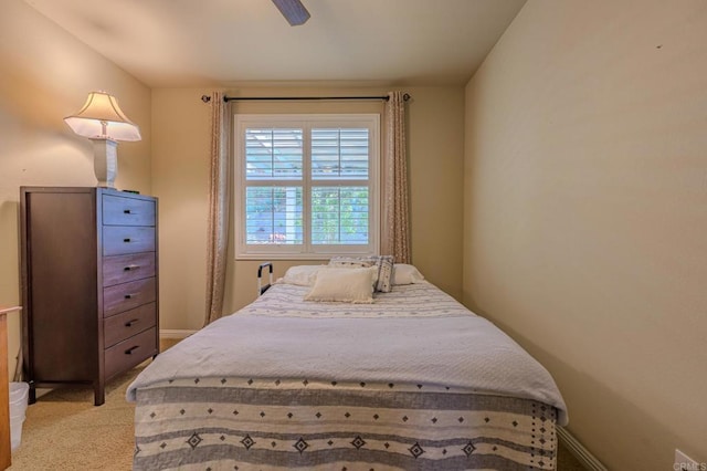 bedroom featuring ceiling fan and light colored carpet