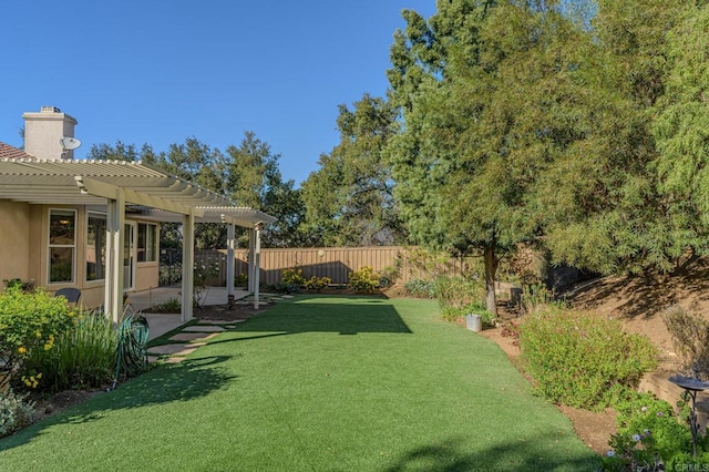 view of yard with a pergola and a patio