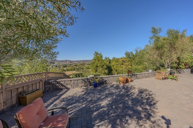 view of patio featuring a mountain view