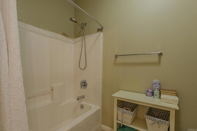 bathroom with shower / bath combo