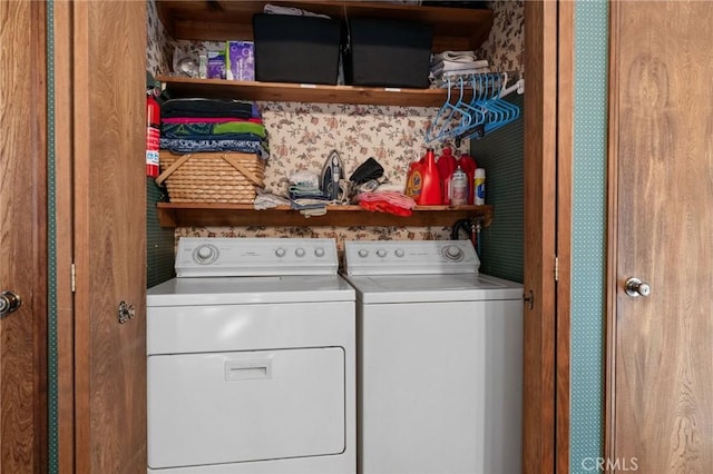 laundry room with washer and clothes dryer