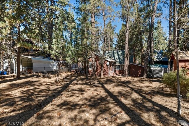 view of yard featuring a carport