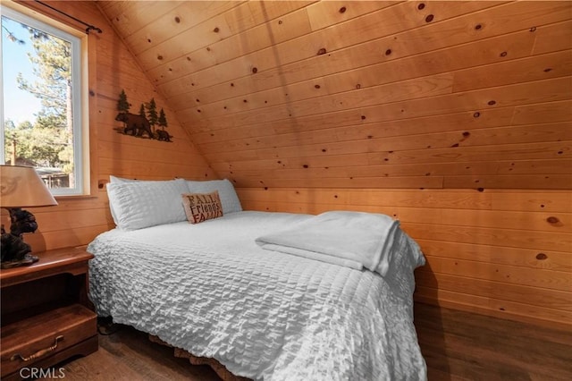 bedroom featuring wooden walls, wood-type flooring, lofted ceiling, and wooden ceiling