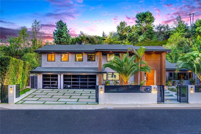 view of front of property featuring a garage