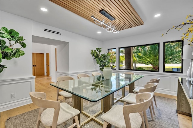 dining area with light hardwood / wood-style flooring