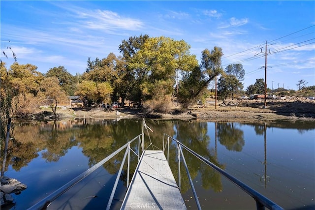 view of dock with a water view