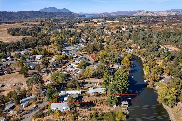 aerial view with a water and mountain view