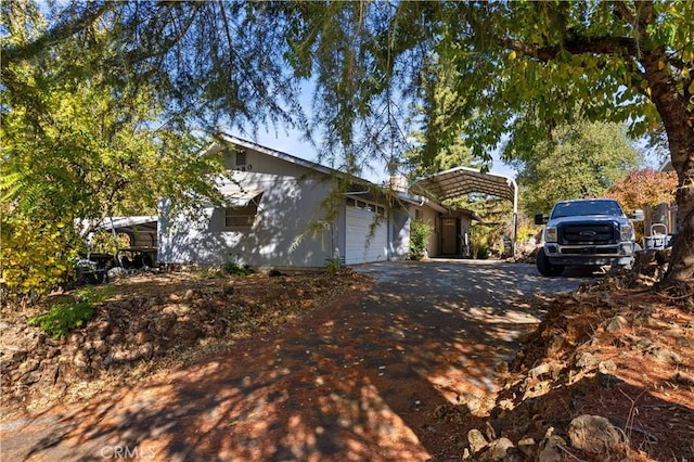 view of property exterior featuring a garage