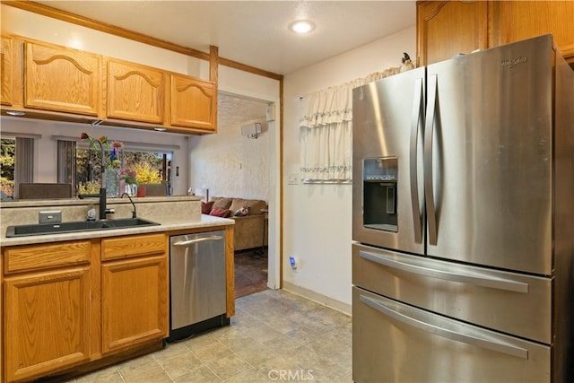 kitchen with appliances with stainless steel finishes and sink