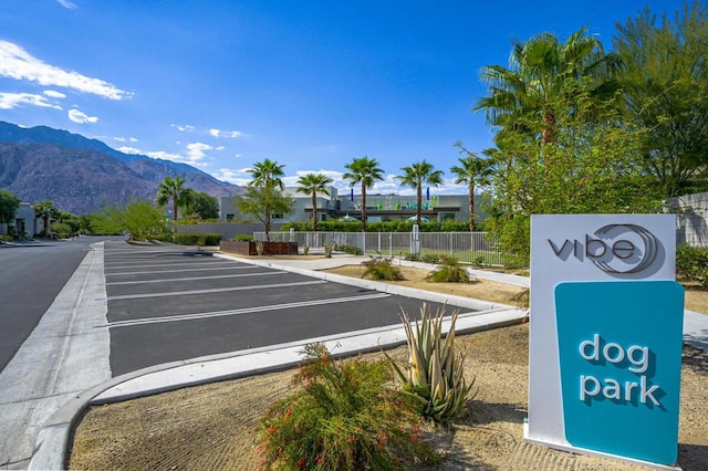 view of parking with a mountain view