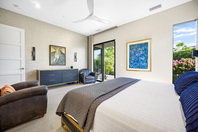 carpeted bedroom featuring access to outside and ceiling fan