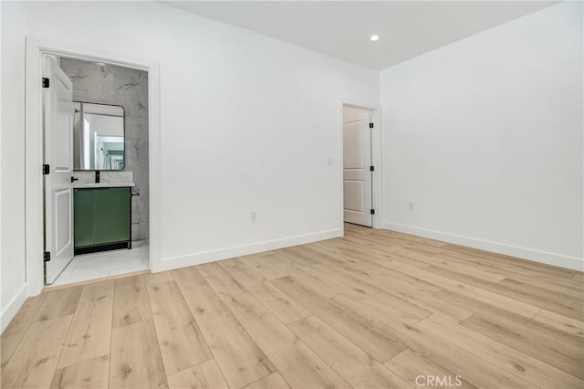 unfurnished bedroom featuring light hardwood / wood-style floors