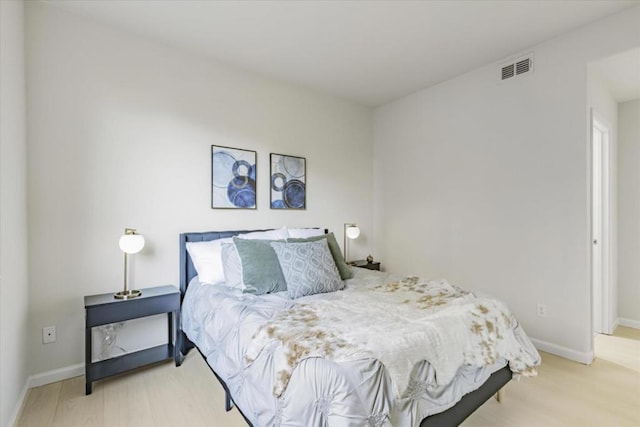 bedroom featuring light hardwood / wood-style floors