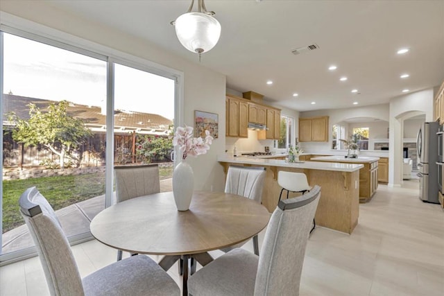 dining area featuring sink