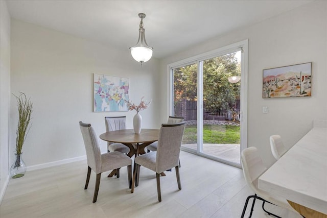 dining room with light hardwood / wood-style flooring