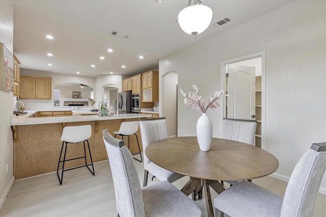 dining room featuring light hardwood / wood-style flooring