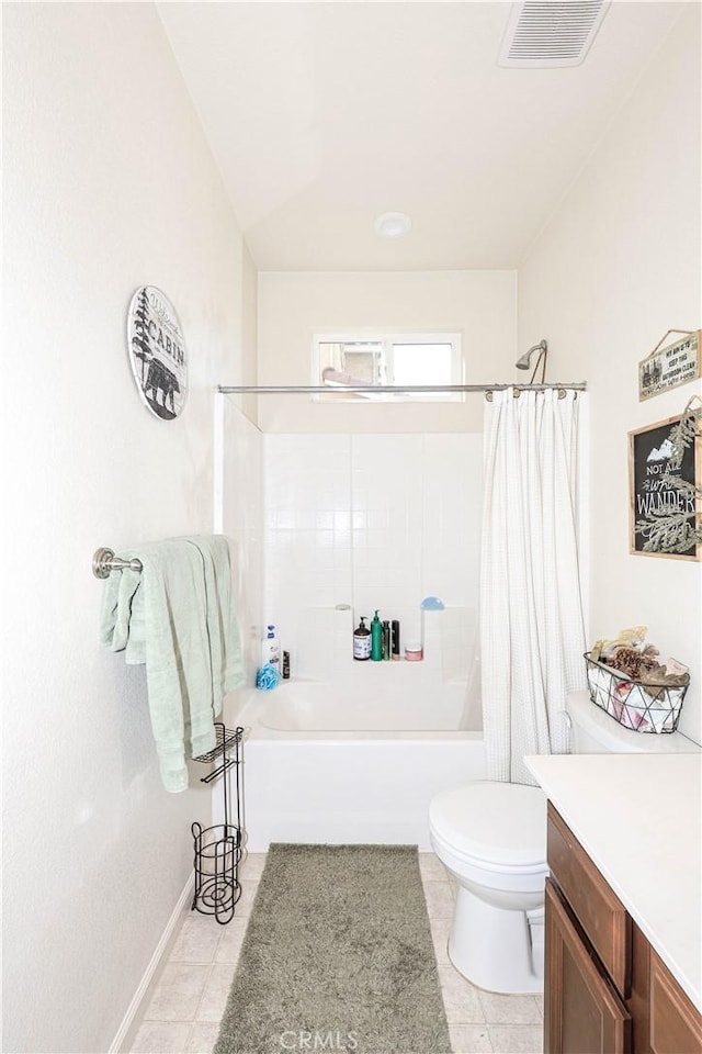 full bathroom featuring tile patterned floors, vanity, shower / bath combination with curtain, and toilet