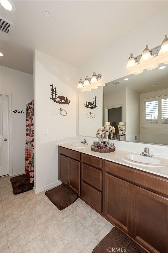 bathroom featuring vanity