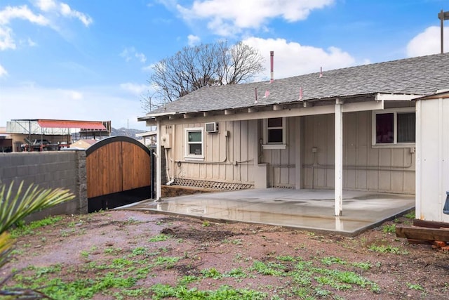 back of property with a patio area