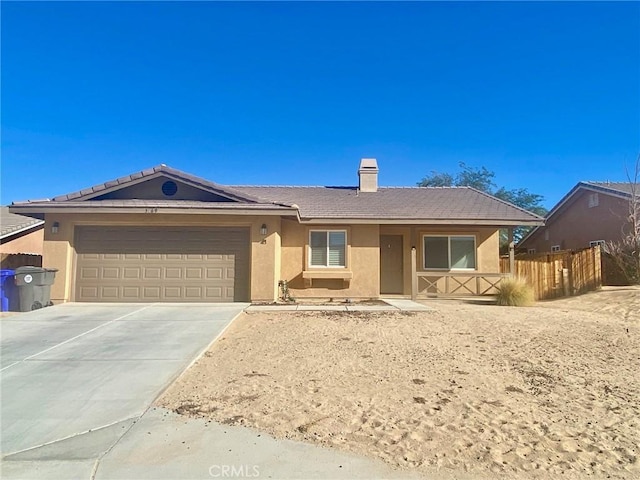 single story home with a garage