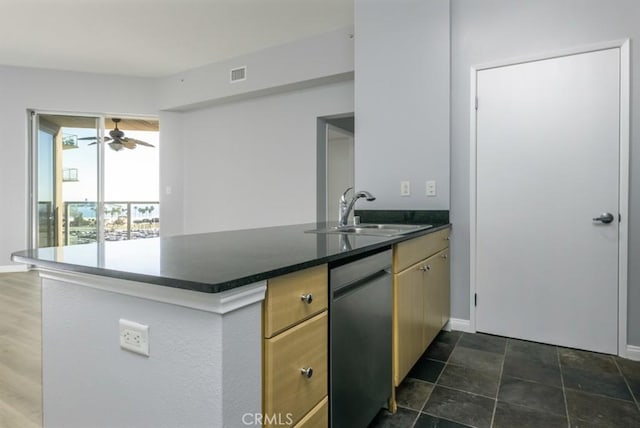 kitchen featuring ceiling fan, kitchen peninsula, dishwasher, and sink