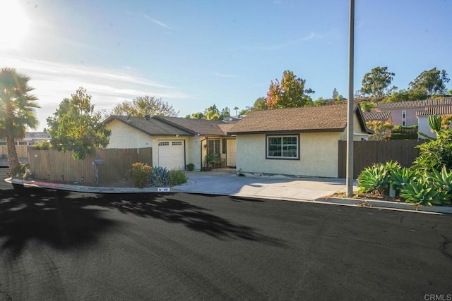 ranch-style home with a garage