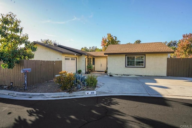 ranch-style house with a garage