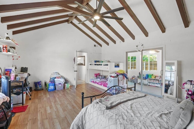 bedroom with beam ceiling, light wood-type flooring, high vaulted ceiling, and a chandelier