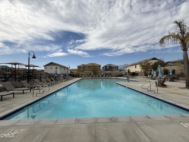 view of pool featuring a patio