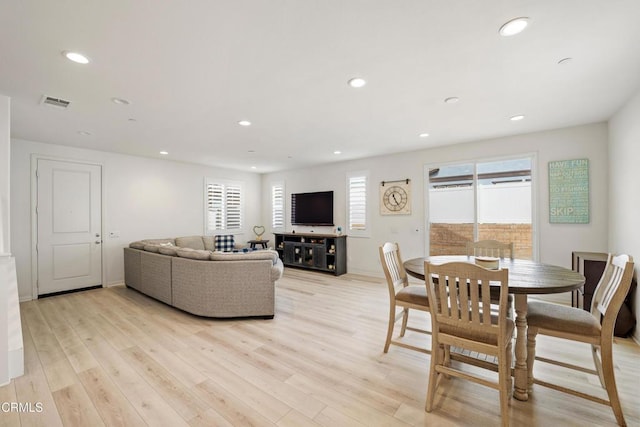 dining room featuring light hardwood / wood-style flooring