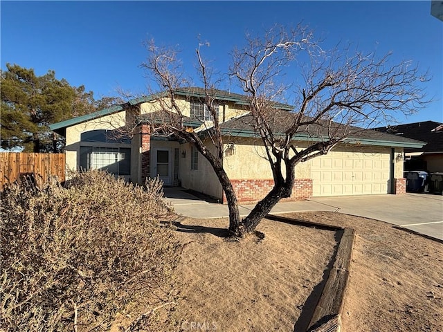 view of front of home featuring a garage