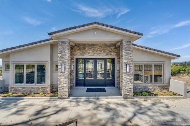 property entrance with french doors