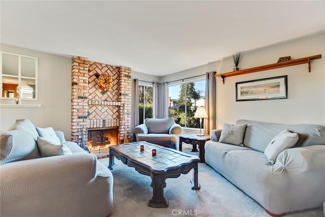 living room with a brick fireplace