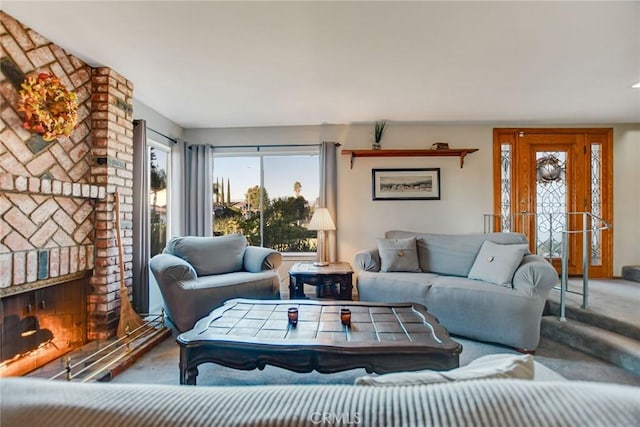 living room with carpet flooring and a brick fireplace