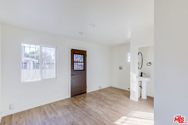 foyer with light wood-type flooring