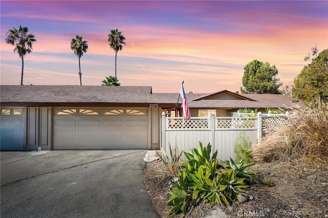 view of front of house with a garage